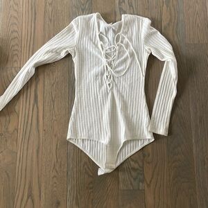 White lace up body suit